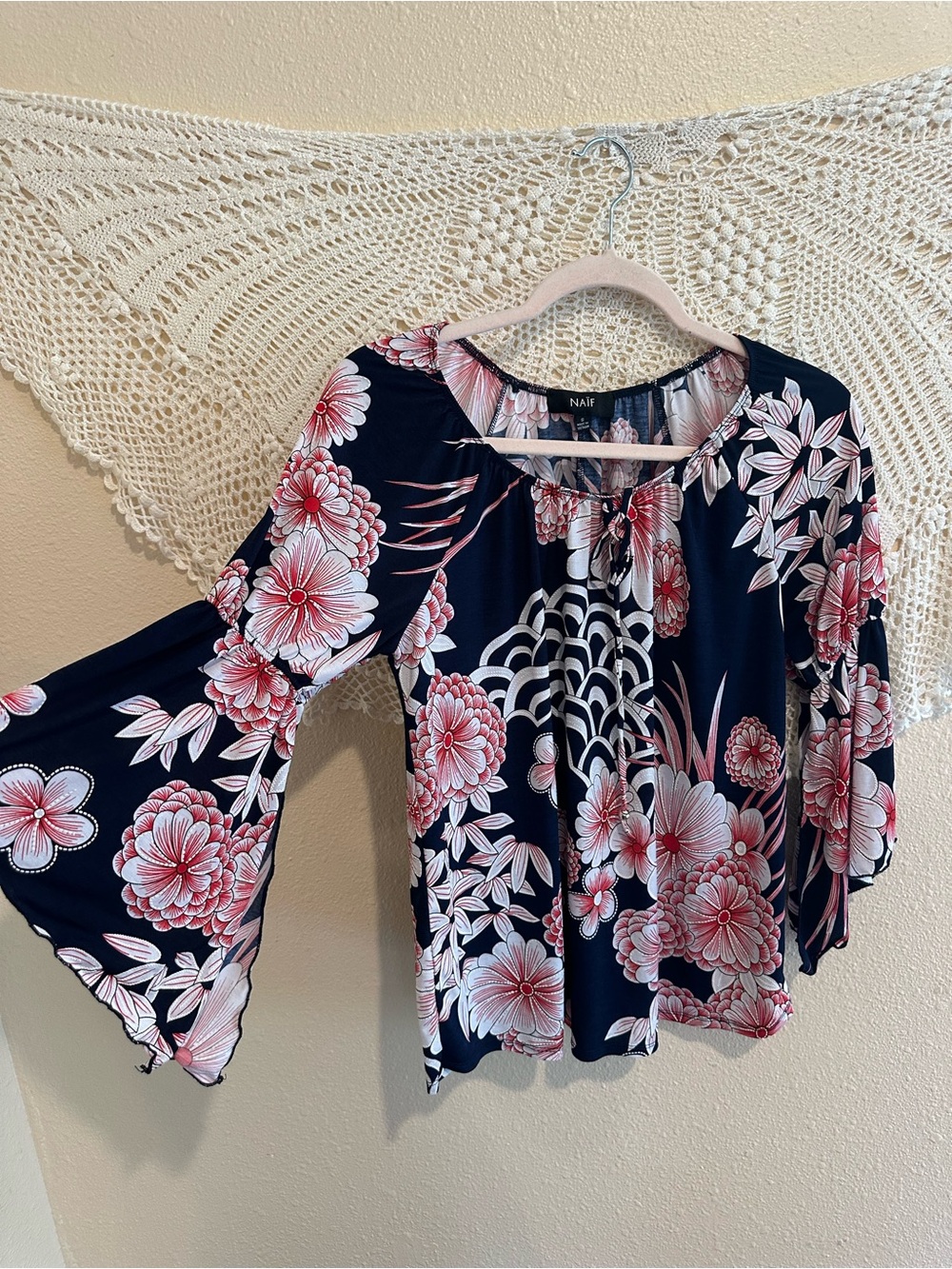 Naïf — Navy Floral Bell-Sleeve Top
